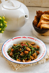traditional indonesian food. asian culinary oseng tempe mixed with long beans