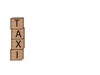 The inscription TAXI on wooden blocks on white background. Letter text on wooden cube.