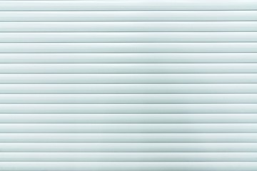 background of white lines, Metal rolled against the door