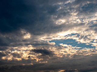 Dark sky with heavy and rainy clouds.