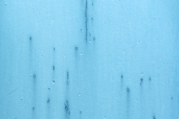 Vintage paper bag pale texture in light blue color on table background. Organic soft turquoise plain back craft book concept for simplicity azure teal scrap backdrop.