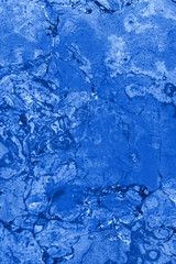 Abstract textured tinted classic blue color surface texture rough background, cement concrete floor or wall. Classic Blue trendy Color of the year 2020 - Image
