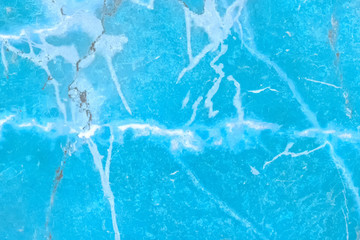 Abstract blue and cyan paint on a surface, texture art background.
