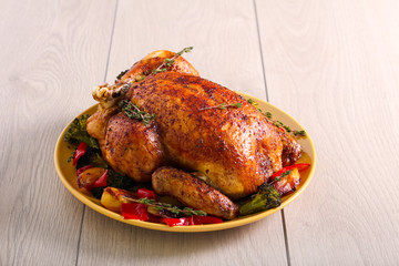 Roast chicken with vegetables served
