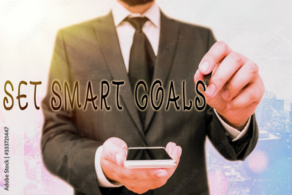 Poster handwriting text set smart goals. conceptual photo giving criteria to guide in the setting of object