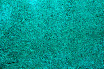 Aquamarine colored wall texture background with textures of different shades of aquamarine