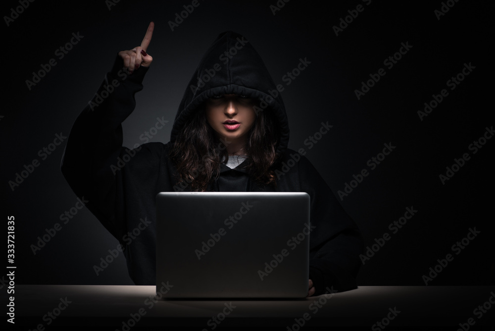Poster female hacker hacking security firewall late in office