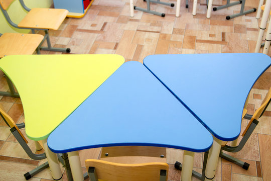 Multi-colored Student Desks In Elementary School