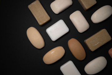 Close up of soap bars on black background