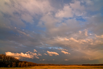 Fototapeta na wymiar A clearing summer storm over a Midwest prairie.