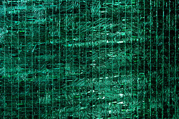 Petrol colored glass texture background with textures of different shades of petrol also called teal