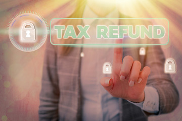Conceptual hand writing showing Tax Refund. Concept meaning refund on tax when the tax liability is...