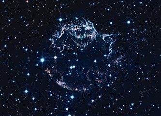 Remains of a supernova explosion. Cassiopeia A. Elements of this image furnished by NASA. Retouched...