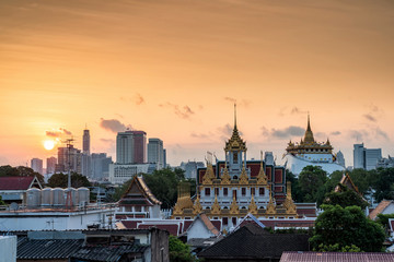 Golden Metal Castle at Wat Ratchanadda (Loha Prasat) and Gloden Mount at Wat Sraket Rajavaravihara at sunrise in Bangkok Thailand. The both famous landmark Temple and pagoda in Bangkok Thailand.