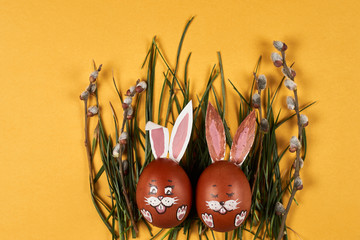 colorful easter eggs on yellow background