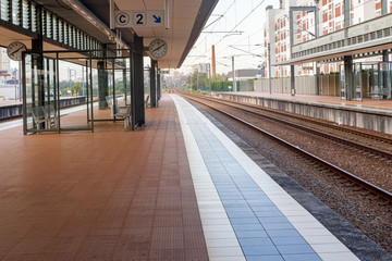 Empty platform of the railway station. Image of traffic stop, complete isolation, self-isolation, quarantine during the Coronovirus COVID-19