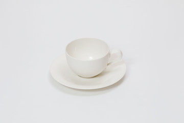 white cup for tea or coffee on a white background