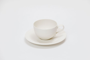 white cup for tea or coffee on a white background