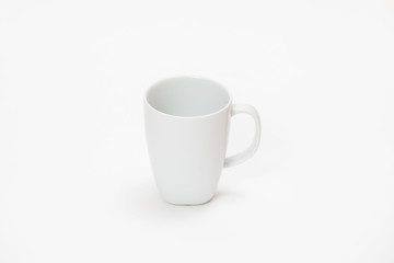 white cup for tea or coffee on a white background