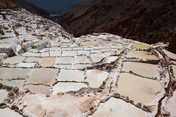 Salt evaporation ponds in the town of Maras in the Sacred Valley near Cusco, Peru