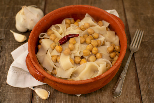 Dish of Lagane with chickpeas, homemade Italian pasta, typical food from the Calabria.