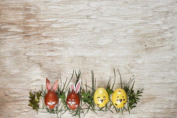 colorful easter eggs on wooden background