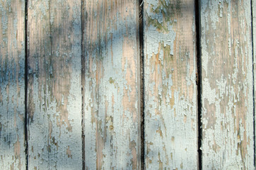 Fototapeta na wymiar Wooden panel from boards in the sunshine