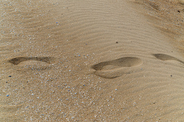 Beautiful sandy structure in the Sahara desert, traces of indigenous people in the desert, close-up