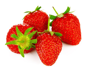 Strawberries with leaves isolated on a white background.