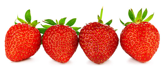 Strawberries with leaves isolated on a white background.