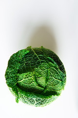Head of green fresh cabbage on white background important for immunity and healthy nutrition