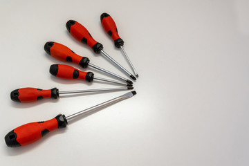Red screwdriver set with white background. Concept industrial