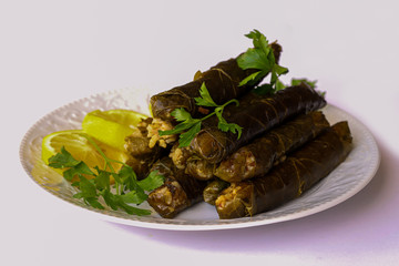 leaf wrap, vine leaf, traditional food, isolated on white, dolmades, sarmale, dolma, lemon slices, appetizer