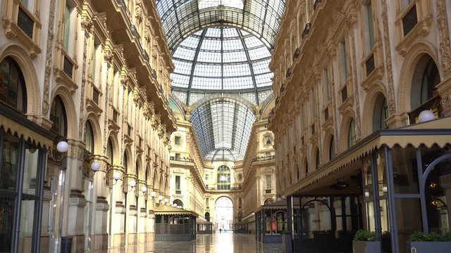 Europe, Italy, Milan March 2020 - completely deserted places of tourist interest, without people, for n-cov19 Coronavirus pandemic - Vittorio Emanuele Gallery in Duomo cathedral EMPTY