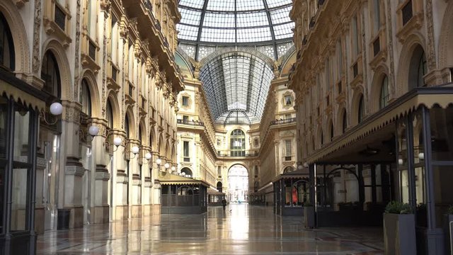 Europe, Italy, Milan March 2020 - completely deserted places of tourist interest, without people, for n-cov19 Coronavirus pandemic - Vittorio Emanuele Gallery in Duomo cathedral EMPTY