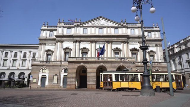 Europe, Italy, Milan March 2020 - completely deserted places of tourist interest, without people, for n-cov19 Coronavirus pandemic - Piazza della Scala - Scala theater 