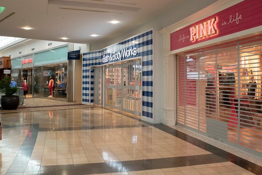 Raleigh, NC/United States- 03/18/2020: Shuttered Retail Stores Are Seen Inside A Deserted Shopping Mall. Many Have Closed Voluntarily Amid The Coronavirus (COVID-19) Outbreak.