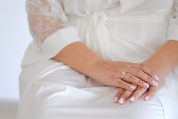 Bride's hand with the engagement ring