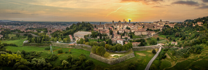Aerial sunset panorama of Bergamo in Lombardia Italy, with dramatic colorful sky