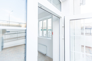 Fototapeta premium The glass door of white office