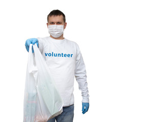 A volunteer carrying basic necessities for senior citizens in Europe. The city is under quarantine due to Covid-19 flu infection.