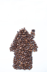 House made from coffee beans, on a white background.