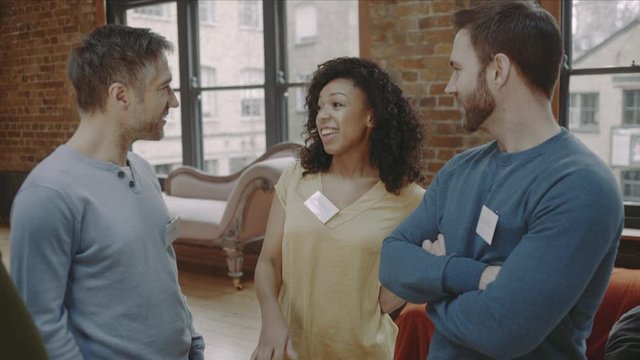 Group meeting and talking at networking event