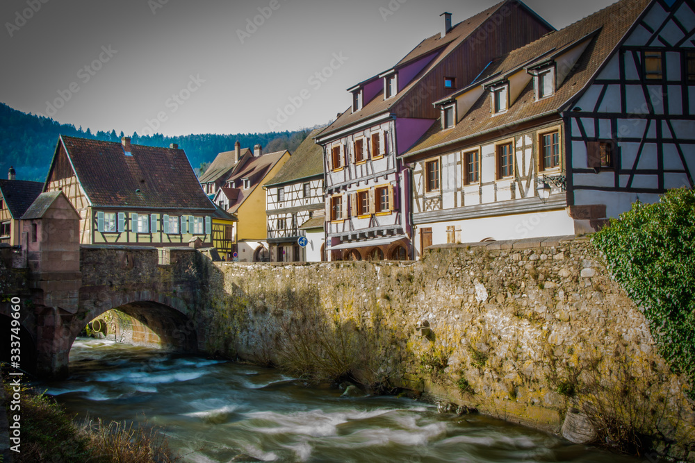 Wall mural morning along the river in kaysersberg