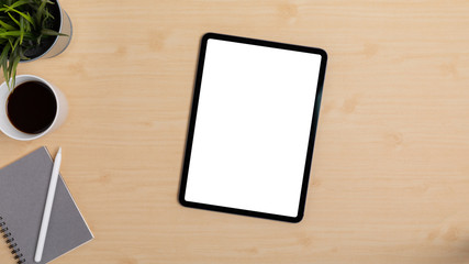 Wooden Table Office desk top view design workspace layout left have plant, coffee cup, pen on top...