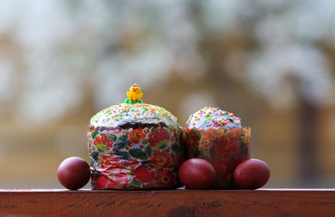 Easter eggs  with Easter cake on a blurred background