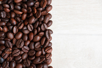 Close-up natural aromatic coffee beans.  Food texture. Empty space for text.