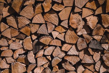 Wooden natural sawn logs as background, top view, flat lay. Wood texture.