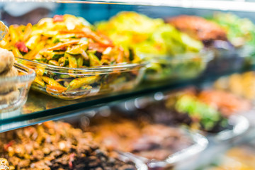 Traditional Asian dishes sold in a food court in Singapore