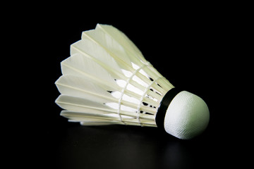 Fototapeta na wymiar badminton shuttlecock on black background